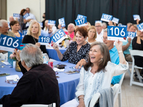 Museum raises nearly $500,000 at Art of a Rose fundraiser